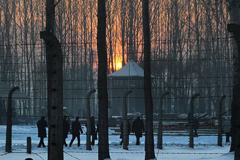 Sunset at the site of the Auschwitz-Birkenau camp in Brzezinka, Poland on Wednesday, the 65th anniversary of the liberation by the Red Army of the Nazi extermination camp.
