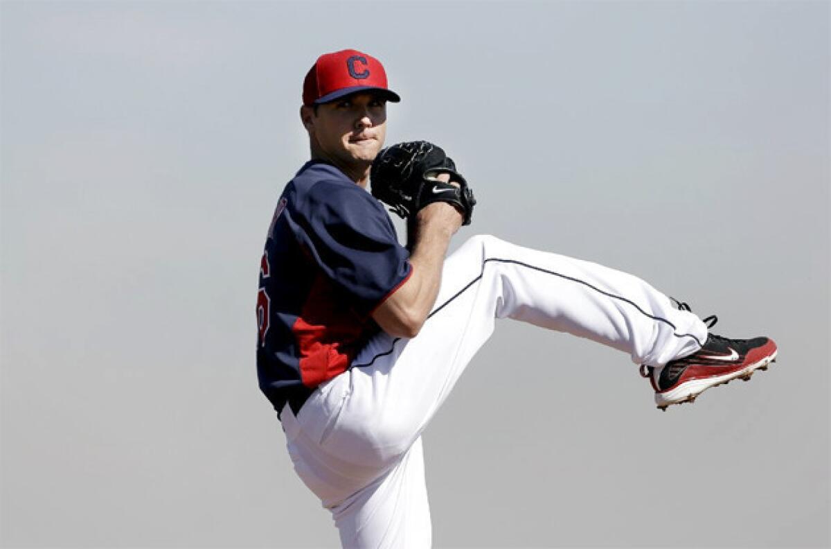 Indians pitcher Scott Kazmir pitched four scoreless innings against the Angels on Monday.