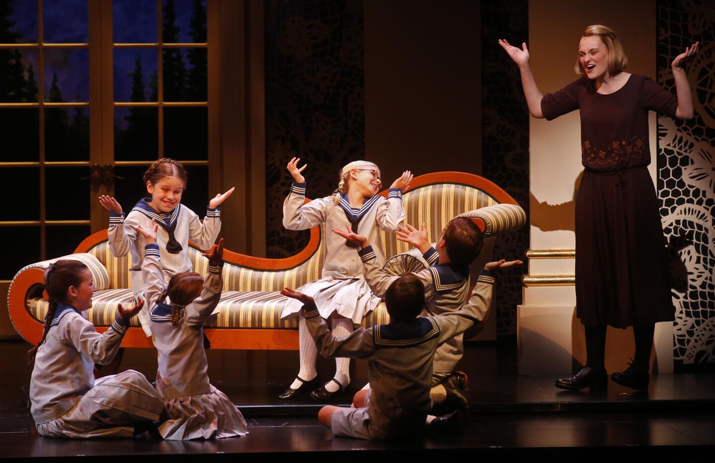 Kerstin Anderson, right, as Maria performs "Do-Re-Mi" with the Von Trapp children in "The Sound of Music."