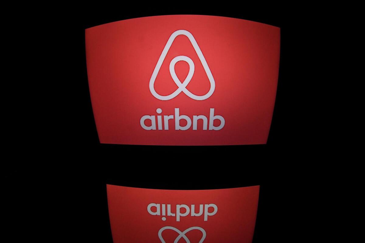 The Airbnb logo displayed on a computer screen.
