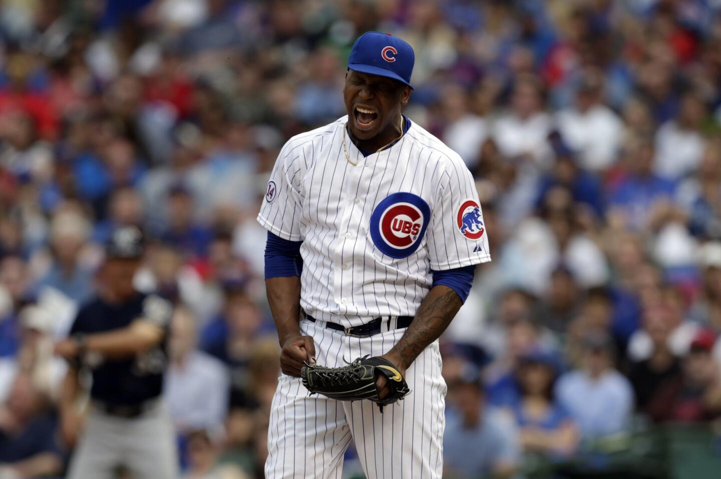 Pedro Strop reacts to giving up the game winning runs during the eighth inning.