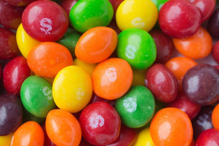 A variety of food byproducts are commonly used for animal feed, and Skittles maker Mars says it does have procedures for discarding foods for that purpose.