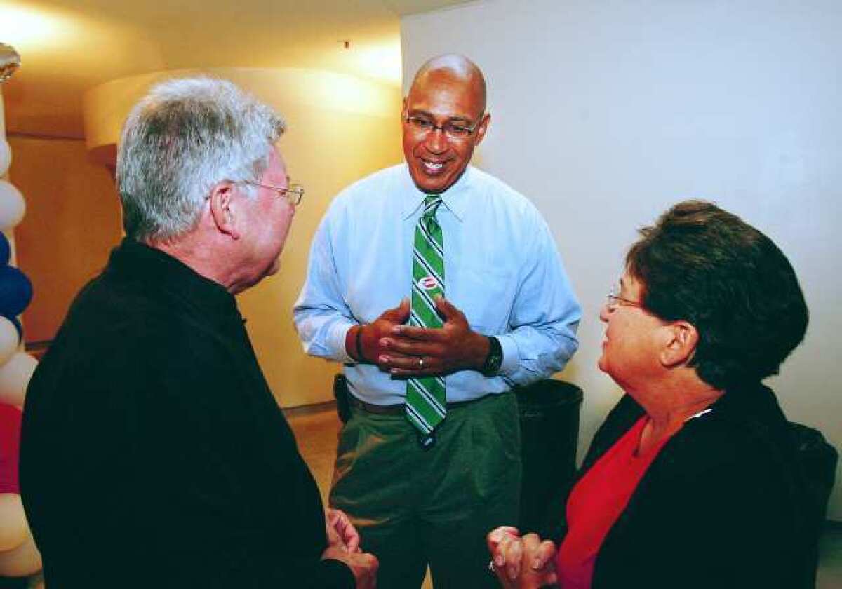 Candidate Chris Holden talks with supporters at the Pasadena Museum of California Art where the Pasadena councilman held his primary election campaign party for his bid for California Assembly Distrcit 41 on June 5, 2012.