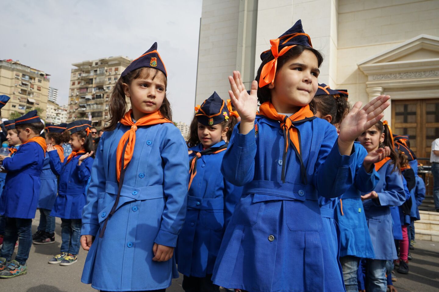 Pro-government pioneers in Damascus' Dumar neighborhood. The elementary school children are part of a ruling party youth group.