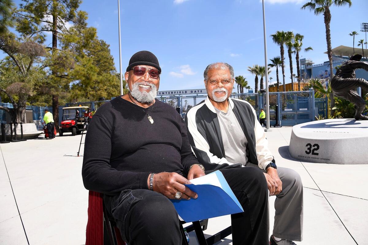 Harry Edwards, left, and former Dodgers All-Star Reggie Smith at Jackie Robinson Day ceremony.