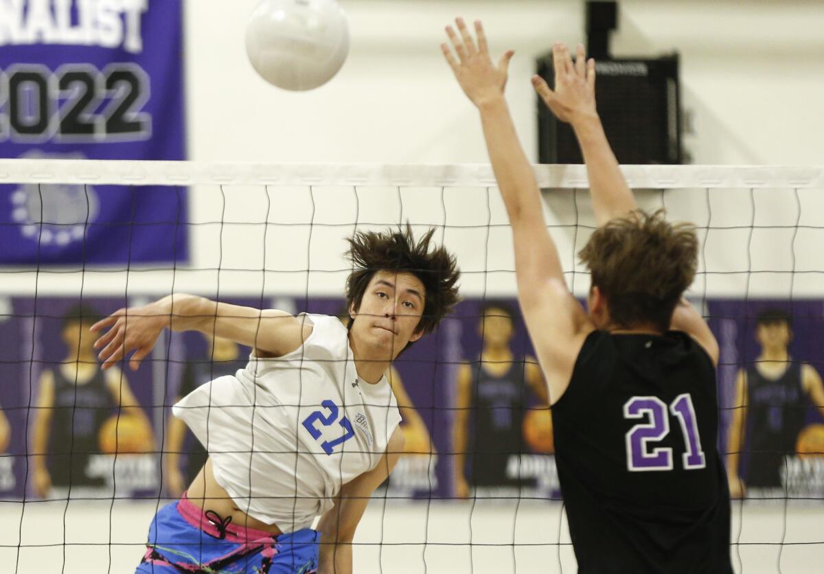 Fountain Valley's Curtis Harper (27) puts a kill away during the first round on Thursday.