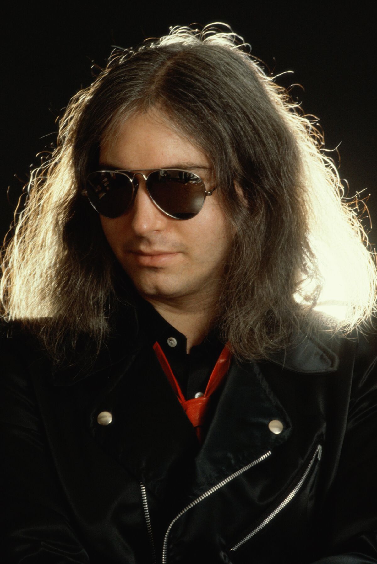 Jim Steinman in sunglasses and long hair.
