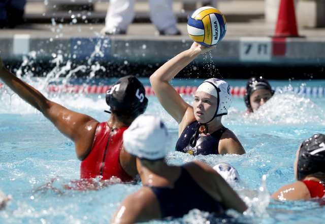 Newport Water Polo Foundation's Sophie Levegue looks to pass during a USA Water Polo Junior Olympics game against Standford Red Thursday.