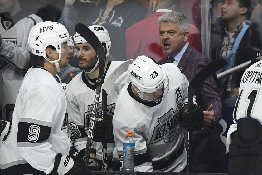 Kings coach Todd McLellan talks to his team during overtime against the Colorado Avalanche on Feb. 22 at Staples Center.