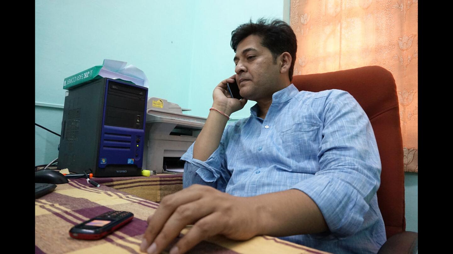 Whistle-blower Anand Rai sits in his office in Indore, India.