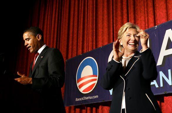 Sen. Hillary Rodham Clinton is rested after a break from campaigning. She claps as Sen. Barack Obama addresses the crowd this morning during a "Women for Obama" fundraising breakfast in New York.