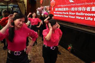 Monterey Park, California January 21, 2024-People dance at the World Seafood Restaurant during the survivors one year ball for the anniversary of the Monterey Park mass shooting. (Wally Skalij/Los Angeles Times)