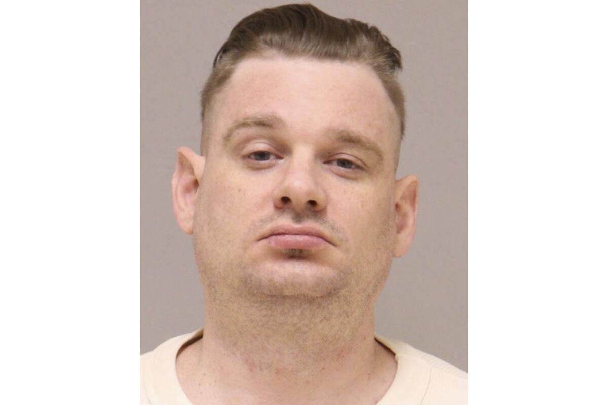 A booking photo of Adam Fox. 