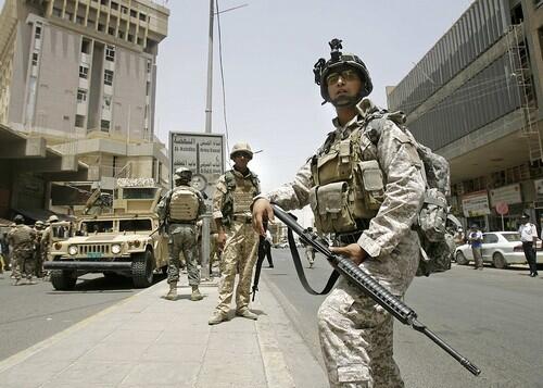 Iraqi soldiers on duty in central Baghdad. The U.S. military still provides assistance in such areas as aerial surveillance, medical evacuations and forensics.