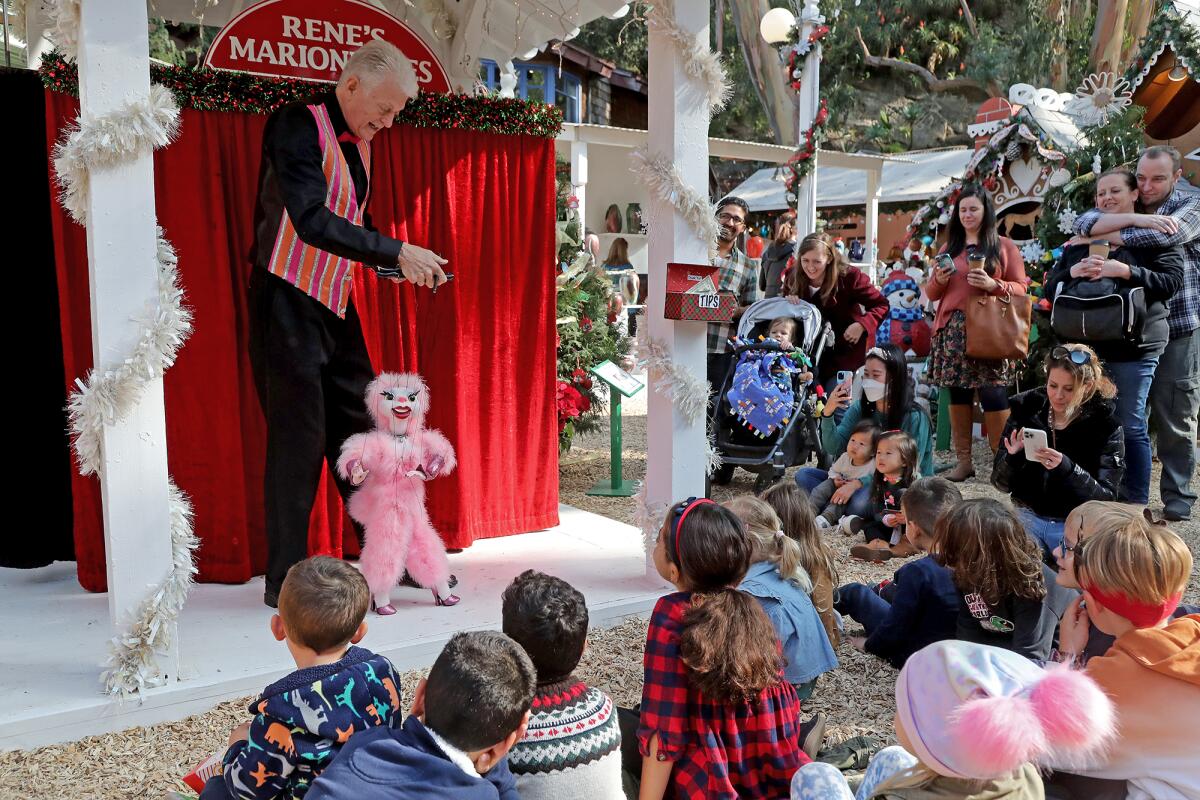 Joe Selph entertains children and parents during Winter Fantasy.