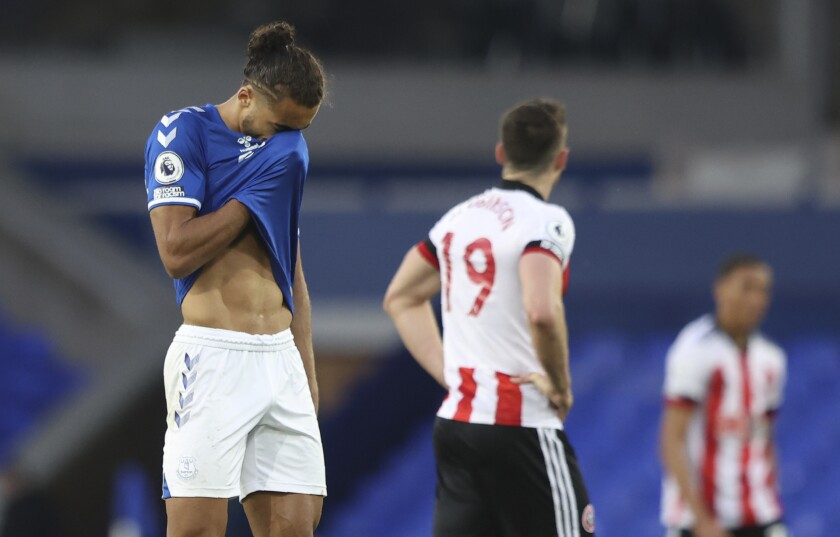 Everton's Dominic Calvert-Lewin reacts disappointed after the English Premier League soccer match between Everton and Sheffield United at Goodison Park in Liverpool, England, Sunday, May 16, 2021. (Alex Pantling/Pool via AP)