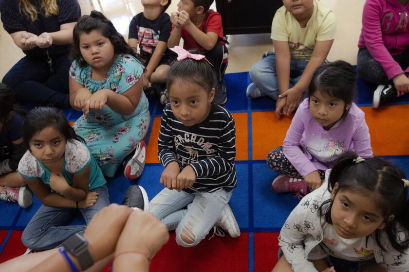 LOS ANGELES, CALIF. - AUGUST 06, 2019: Students sound out words phonetically at Esperanza Elementary School on Tuesday, Aug. 6, 2019 in Los Angeles, Calif. L.A. Unified is running a new summer program for incoming first graders who are slightly behind academically to ensure they catch up and don't need more interventions and credit recovery when they're older. (Liz Moughon / Los Angeles Times)