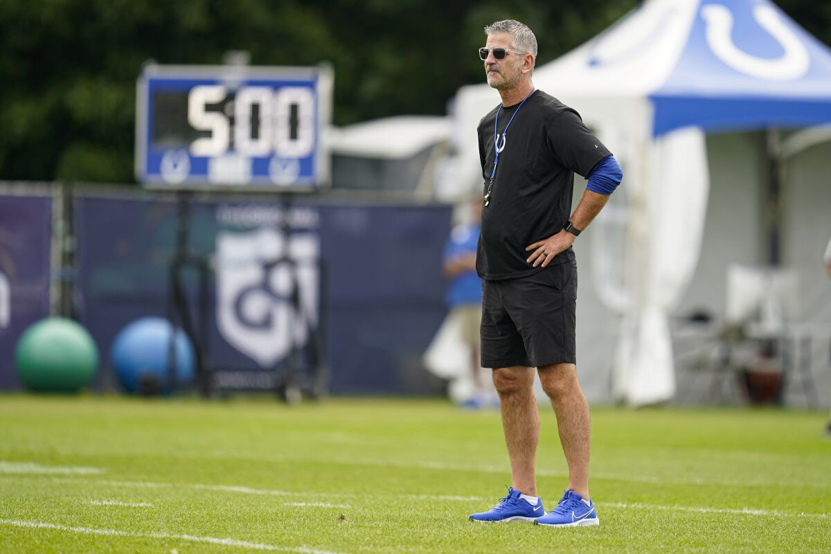 Indianapolis Colts head coach Frank Reich watches practice at the NFL team's football training camp in Westfield, Ind., Friday, Aug. 6, 2021. (AP Photo/Michael Conroy)