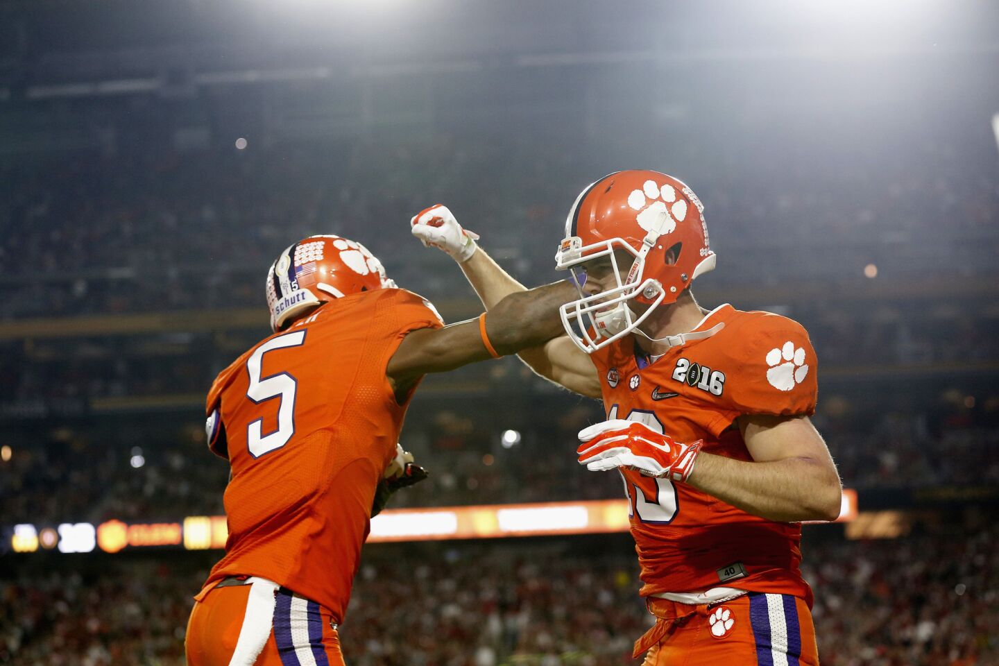 Clemson receiver Hunter Renfrow (13) celebrates with ateammate Germone Hopper (5) after scoring his second touchdown.