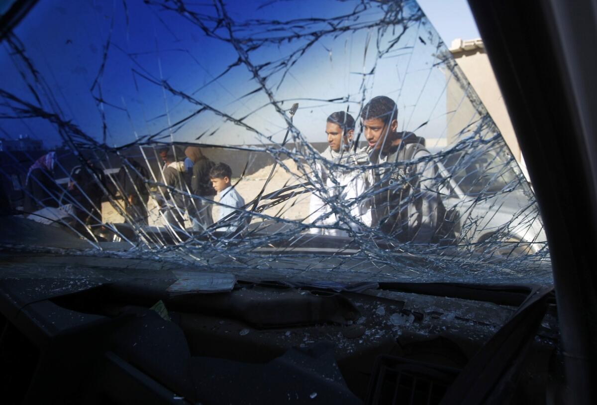 A vehicle damaged by an Israeli airstrike in Gaza on Sunday.