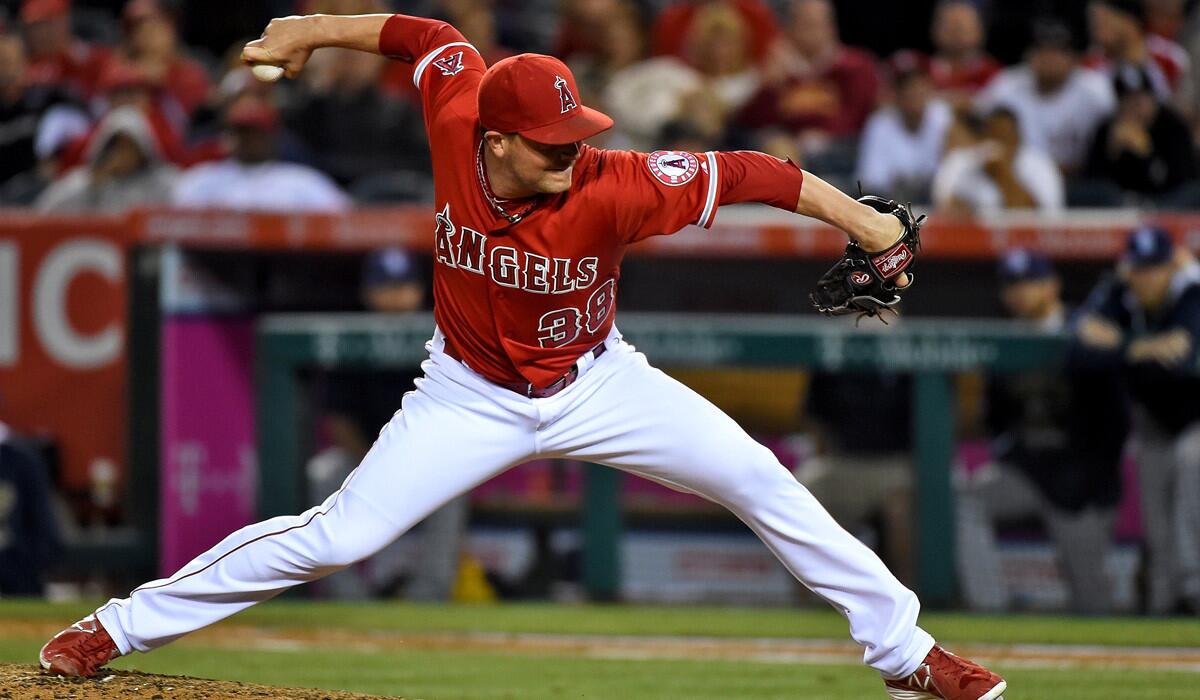 Angels' Joe Smith pitches during a 4-0 loss to the San Diego Padres at Angel Stadium on Tuesday.