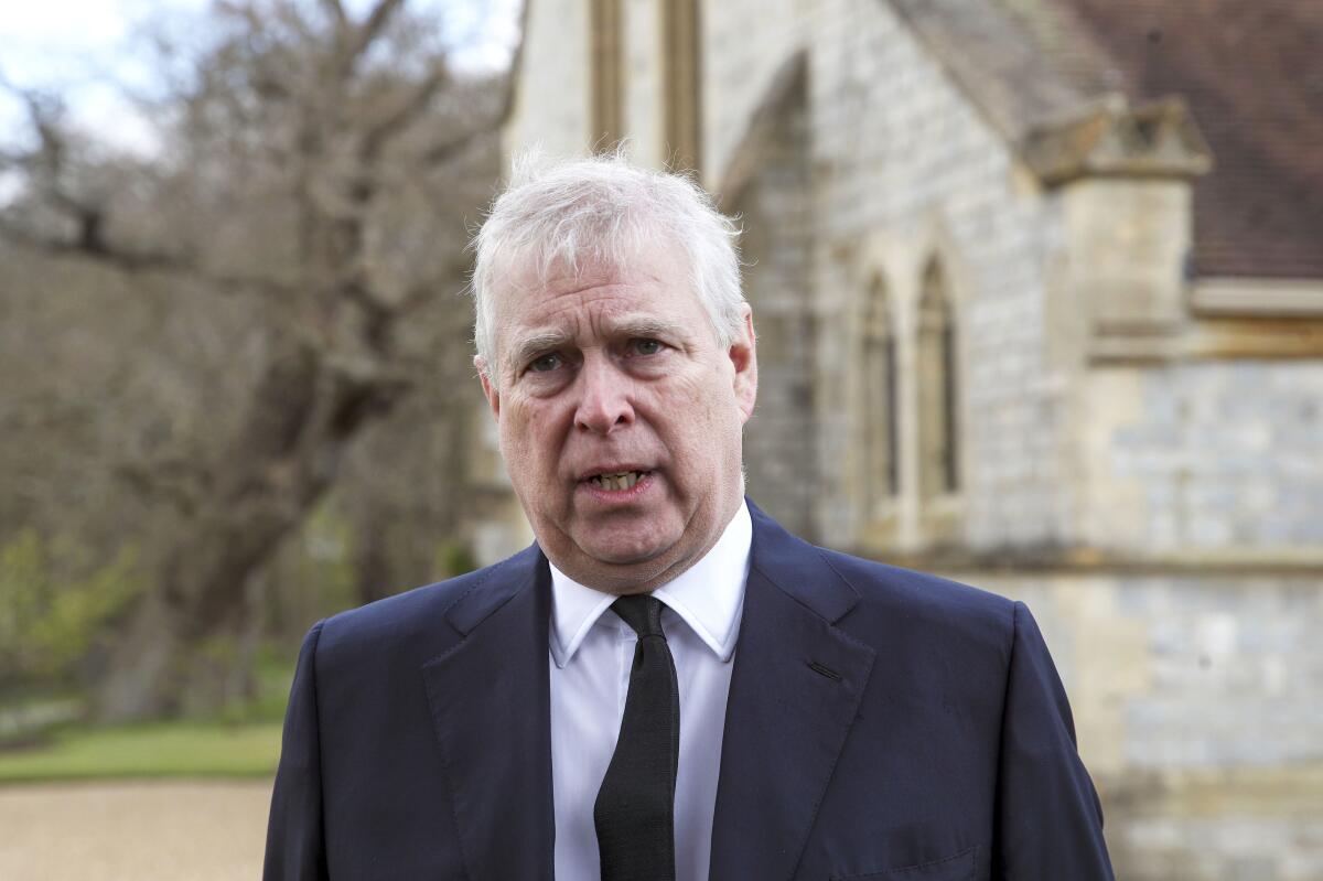 FILE - In this Sunday, April 11, 2021 file photo, Britain's Prince Andrew speaks. during a television interview at the Royal Chapel of All Saints at Royal Lodge, Windsor, England, Sunday, April 11, 2021. A U.S. court will hold a pretrial conference Monday, Sept. 13, 2021 in the civil suit filed by a woman who claims Prince Andrew sexually assaulted her as the two sides argue over whether the prince has been properly served with documents in the case. Attorneys for Virginia Giuffre say the documents were handed over to a Metropolitan Police officer on duty at the main gates of Andrew’s home in Windsor Great Park on Aug. 27. (Steve Parsons/Pool Photo via AP, File)