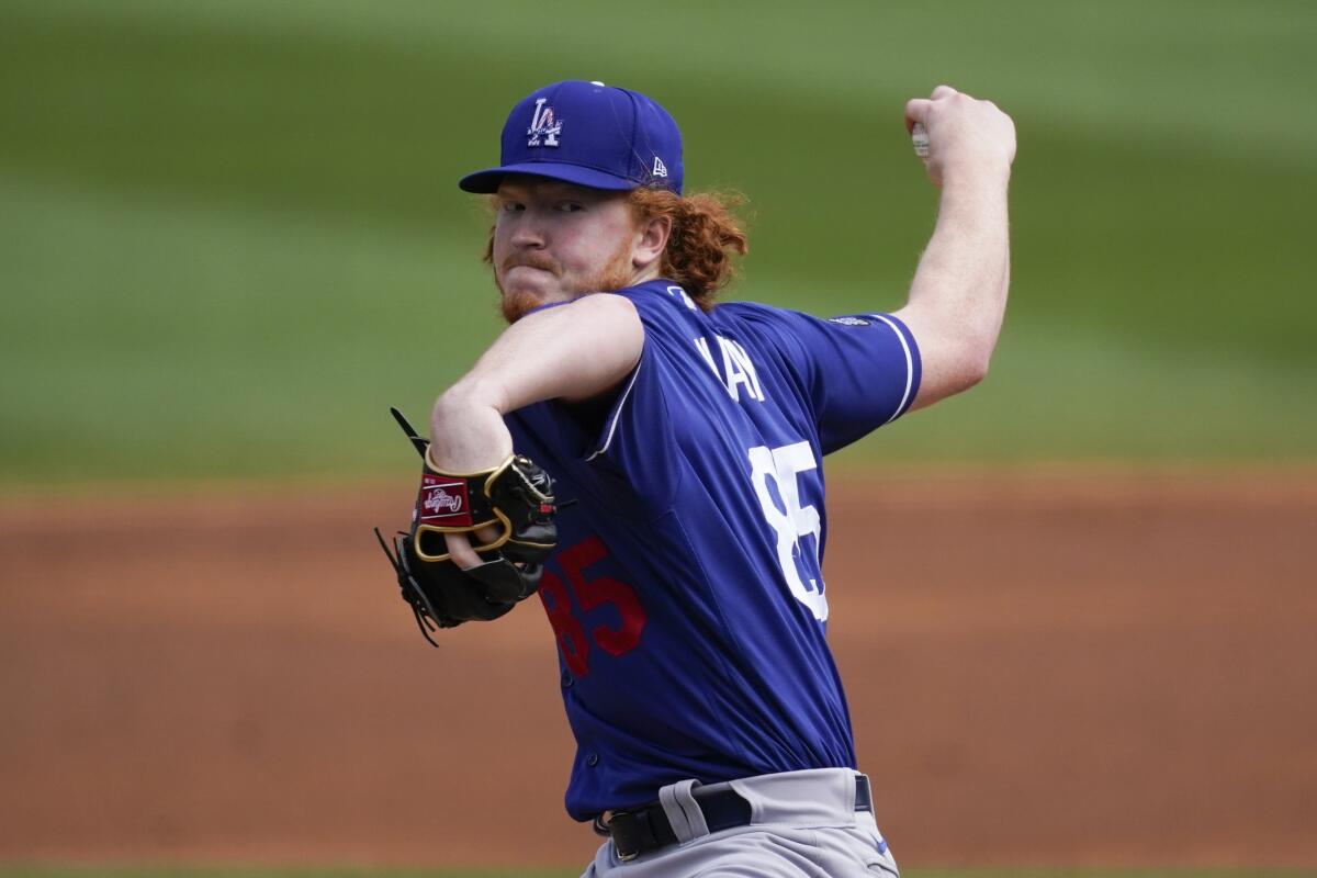 The Dodgers' Dustin May pitches against the Colorado Rockies on March 15, 2021, in Scottsdale, Ariz.