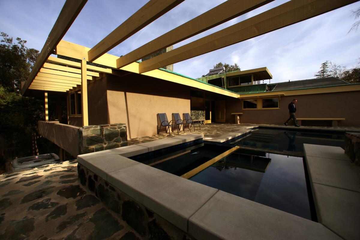 The design of the new pool was created with archetect Rudolph Schindler in mind. It anchors the backyard.