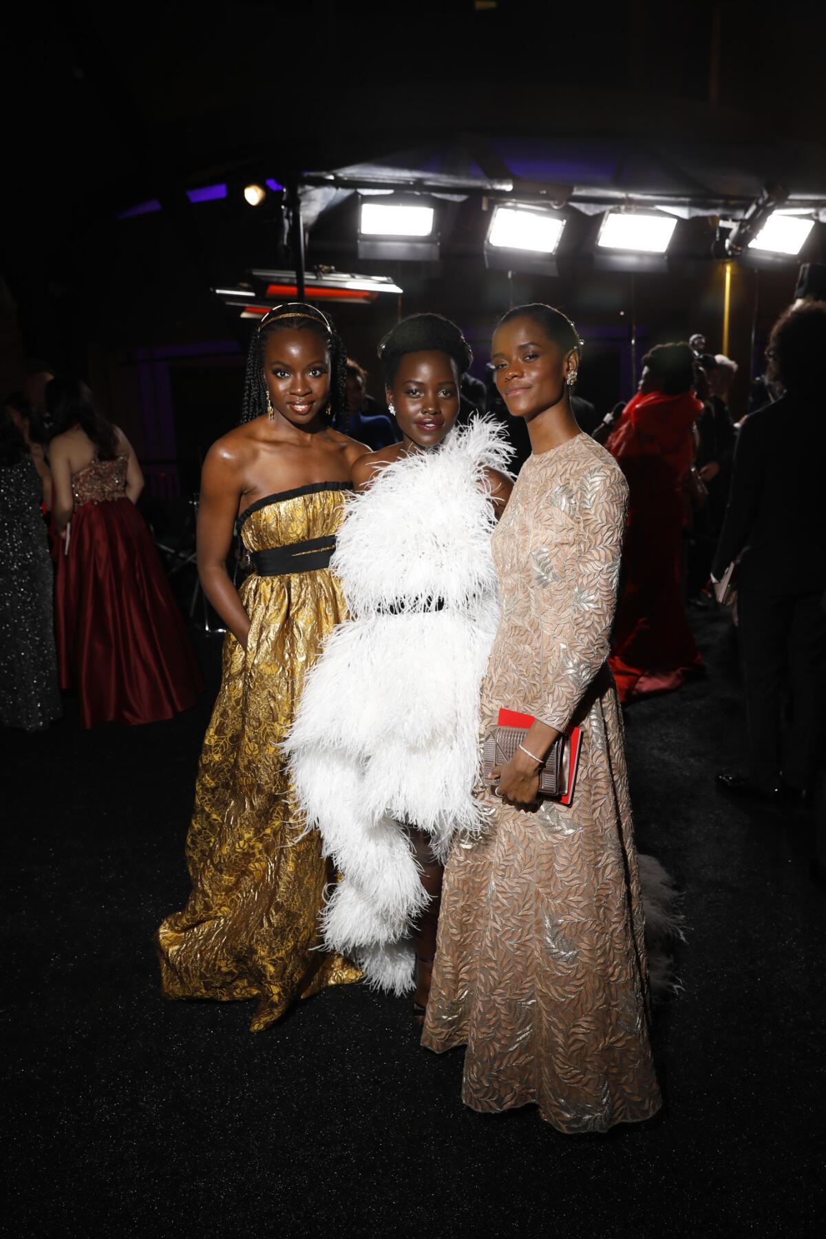 "Black Panther" cast members, from left, Danai Gurira, Lupita Nyong'o and Letitia Wright