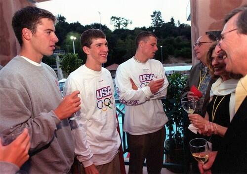 A very youthful Michael Phelps, second from left, and other Olympic team members get a send-off at the Rose Bowl Aquatics Center in Pasadena after training for the 2000 Sydney Games.