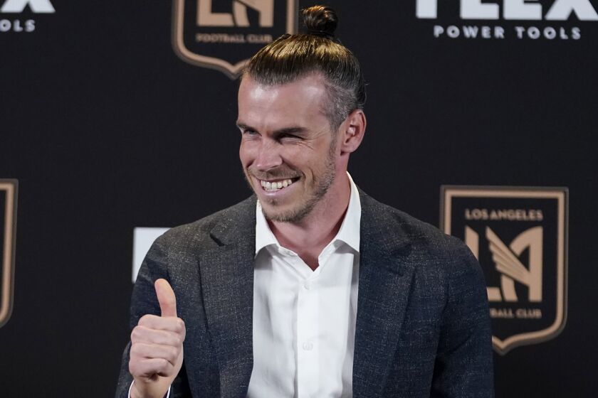 Gareth Bale gives a thumbs-up as he is introduced as a new member of the Los Angeles FC.