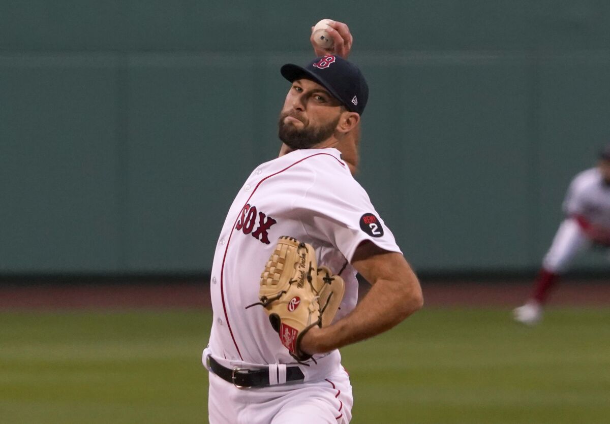 Boston Red Sox starting pitcher Michael Wacha throws during the first inning of the team's baseball game against the Los Angeles Angels at Fenway Park, Tuesday, May 3, 2022, in Boston. (AP Photo/Mary Schwalm)