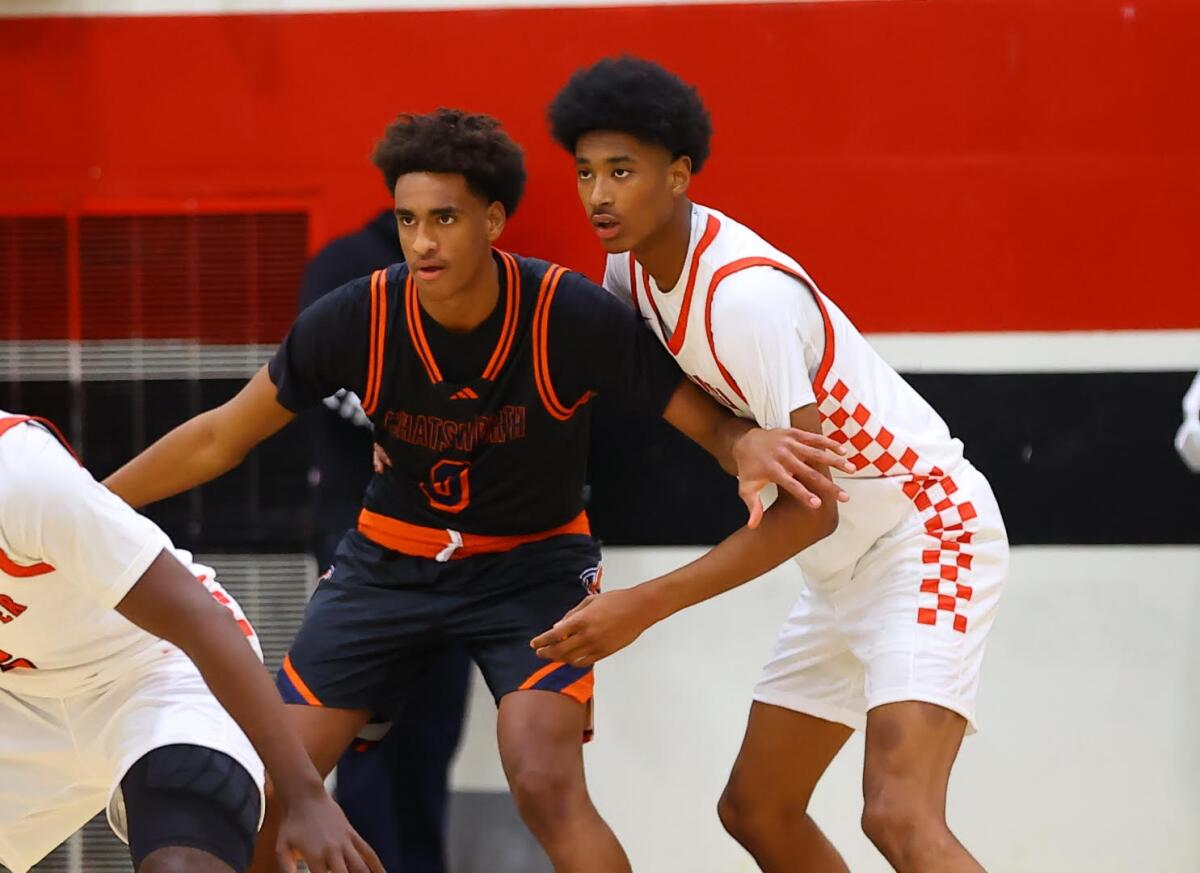 The co-City players of the year, Alijah Arenas (left) and Tajh Ariza.