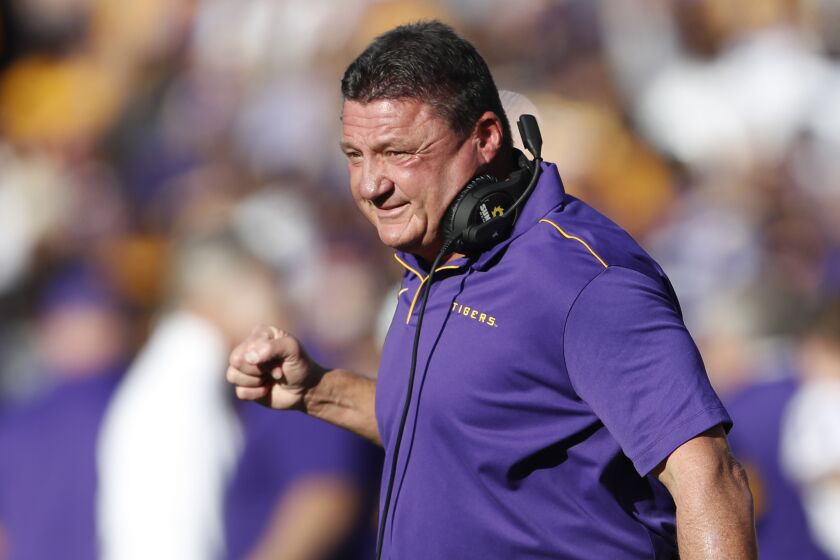LSU head coach Ed Orgeron reacts after an LSU touchdown in the first half of an NCAA college football game against Alabama, Saturday, Nov. 9, 2019, in Tuscaloosa, Ala. (AP Photo/John Bazemore)