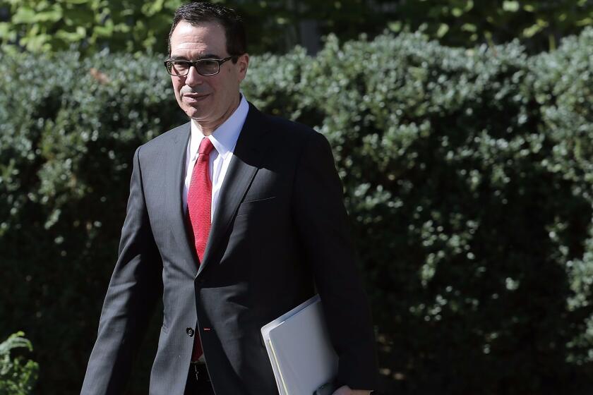 WASHINGTON, DC - OCTOBER 17: U.S. Treasury Secretary Stephen Mnuchin walks into the Rose Garden for a joint news conference with President Donald Trump and Greek Prime Minister Alexis Tsipras at the White House October 17, 2017 in Washington, DC. A left-wing socialist, Tsipras was critical of Trump during his 2016 presidential campaign. But with tension high between the U.S. and Turkey, Trump and Tsipras are looking for renewed ties as they discuss defense, economic issues, energy security and cultural ties, according to the White House. (Photo by Chip Somodevilla/Getty Images) ** OUTS - ELSENT, FPG, CM - OUTS * NM, PH, VA if sourced by CT, LA or MoD **