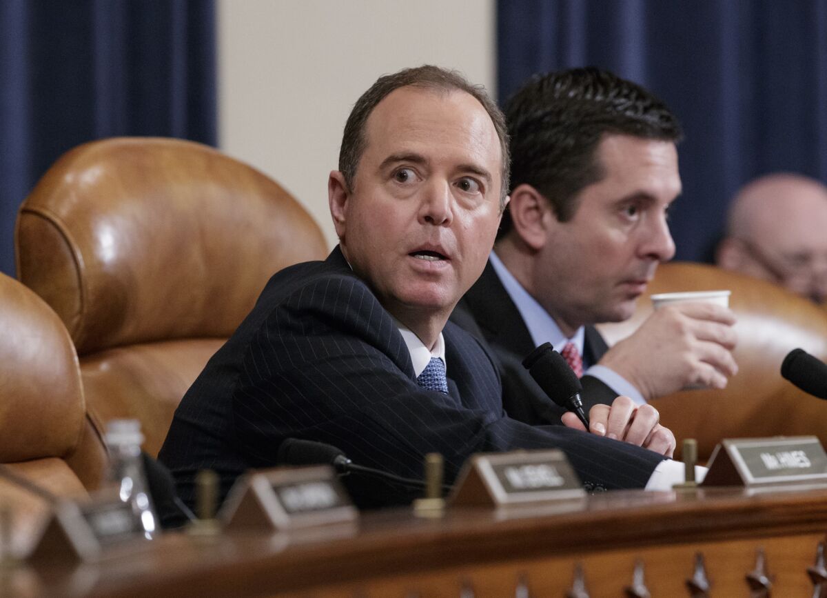 Schiff, left, and Rep. Devin Nunes (R-Tulare), the committee chairman.
