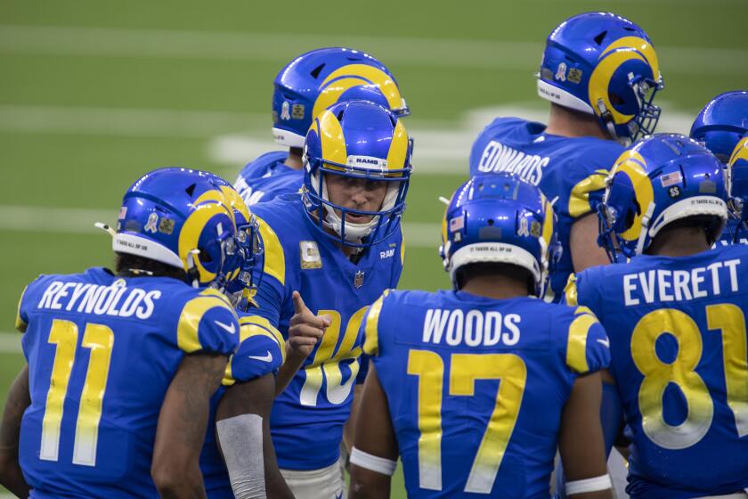 Los Angeles Rams quarterback Jared Goff (16) leads a huddle during an NFL football game against the Seattle Seahawks Sunday, Nov. 15, 2020, in Inglewood, Calif. (AP Photo/Kyusung Gong)
