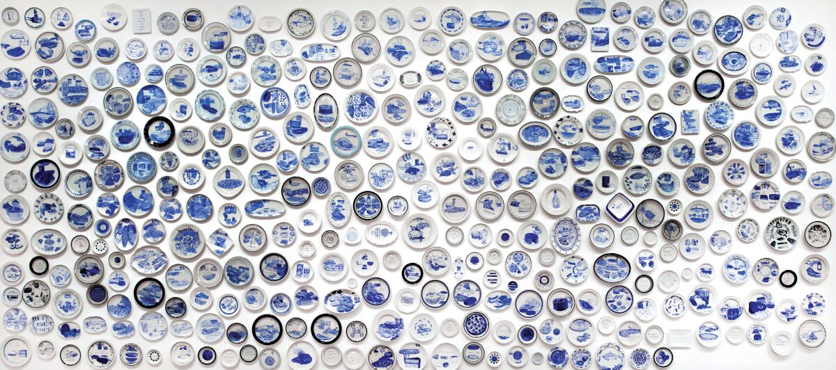 An installation view of "The Last Supper," 2000-present, by Julie Green, at the American Museum of Ceramic Art in Pomona.