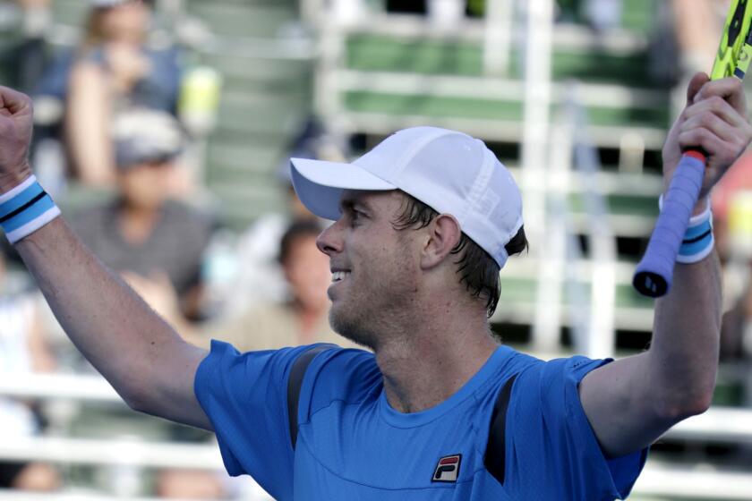 Sam Querrey reacts after defeating Rajeev Ram in championship match of the Delray Beach Open on Sunday.