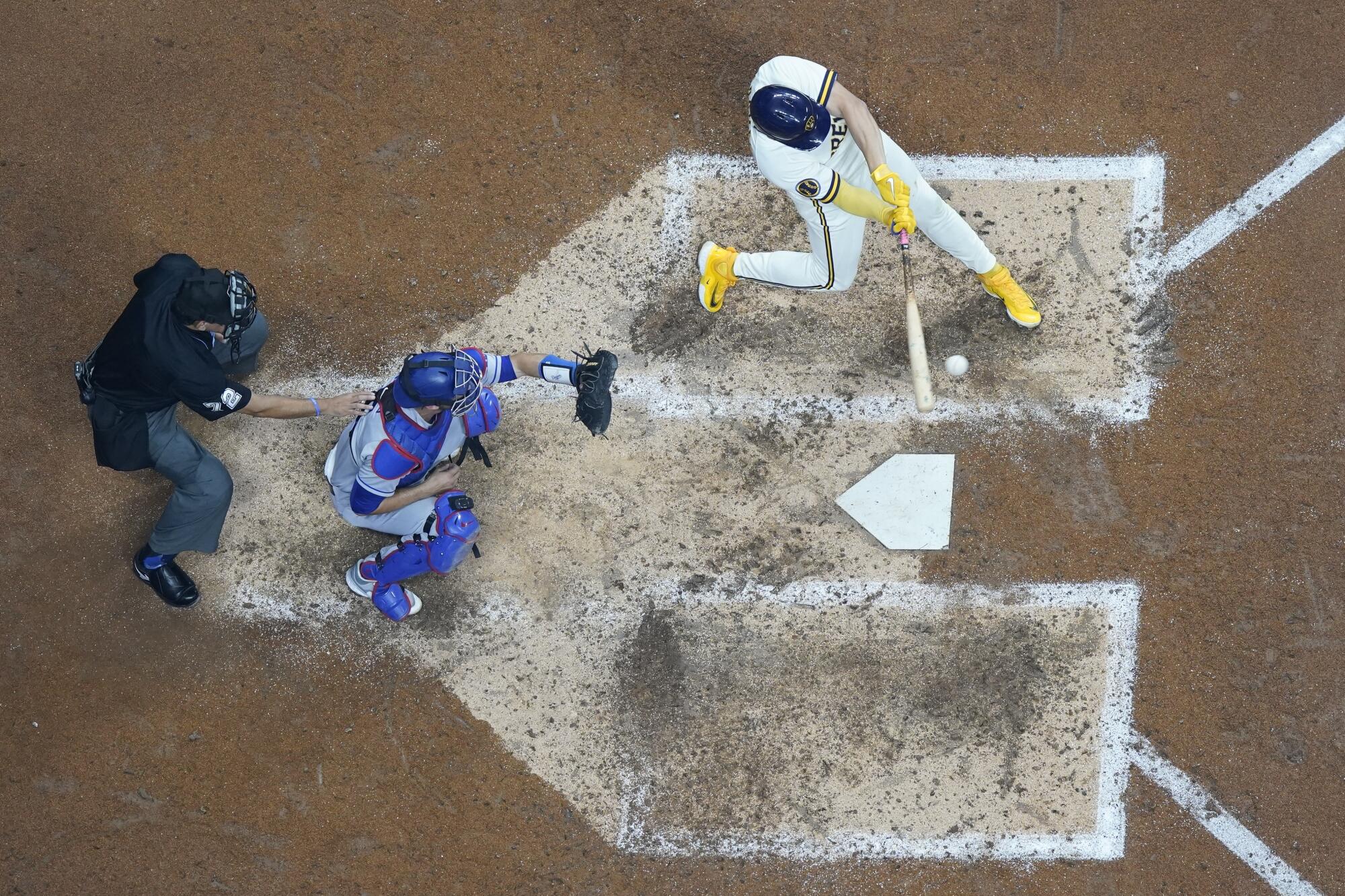 Milwaukee Brewers' Willy Adames hits a three-run home run during the seventh inning.