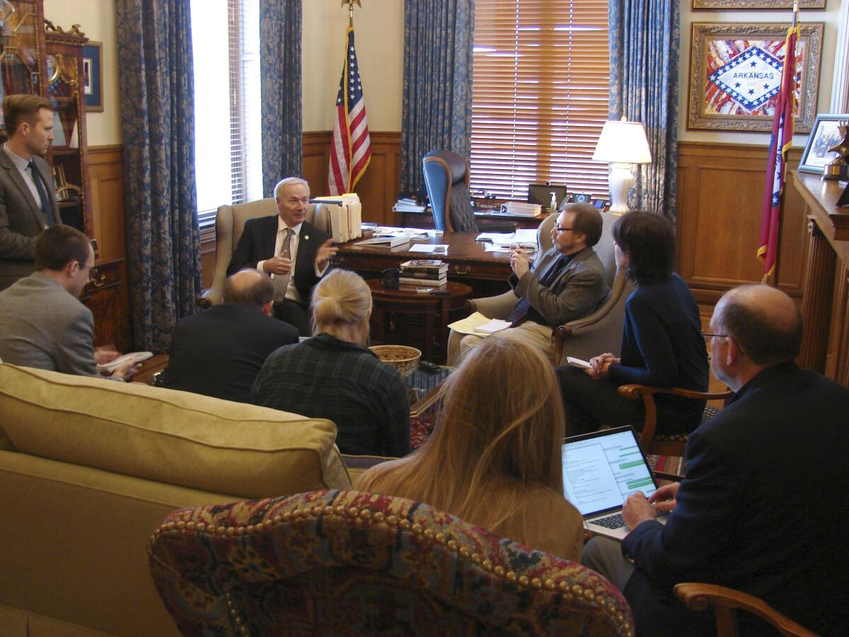 Arkansas Gov. Asa Hutchinson visits with reporters at his State Capitol office on Thursday, Jan. 26, 2017, to discuss Arkansas Act 45, a bill limiting a common second-trimester abortion procedure.