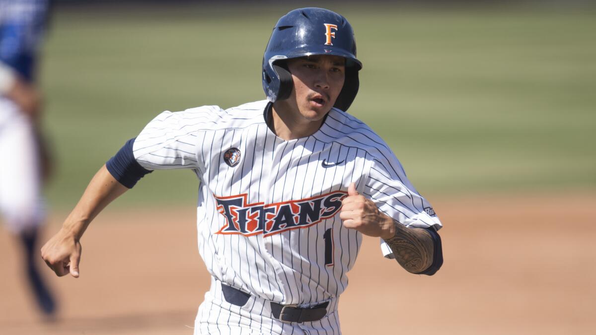 Cal State Fullerton's Zach Lew runs the bases against UC Santa Barbara.