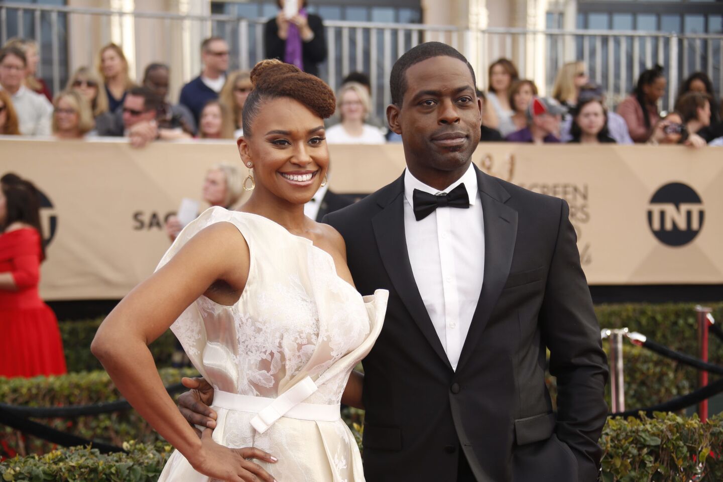 Actor Sterling K. Brown and his wife, actress Ryan Michelle Bathe, arrive at the Screen Actors Guild Awards at the Shrine Auditorium in Los Angeles.