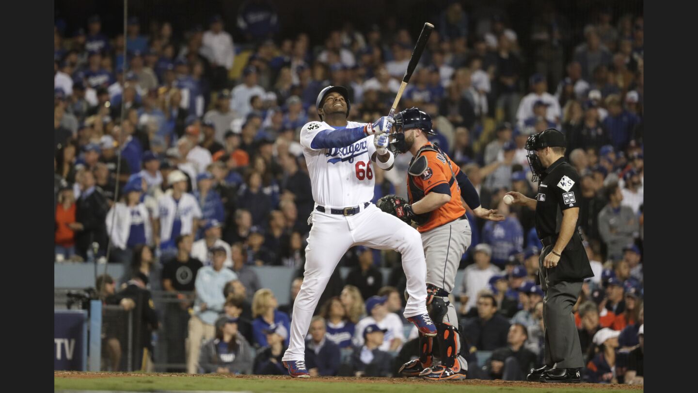Yasiel Puig shows his frustration after fouling off a pitch in the fifth inning.