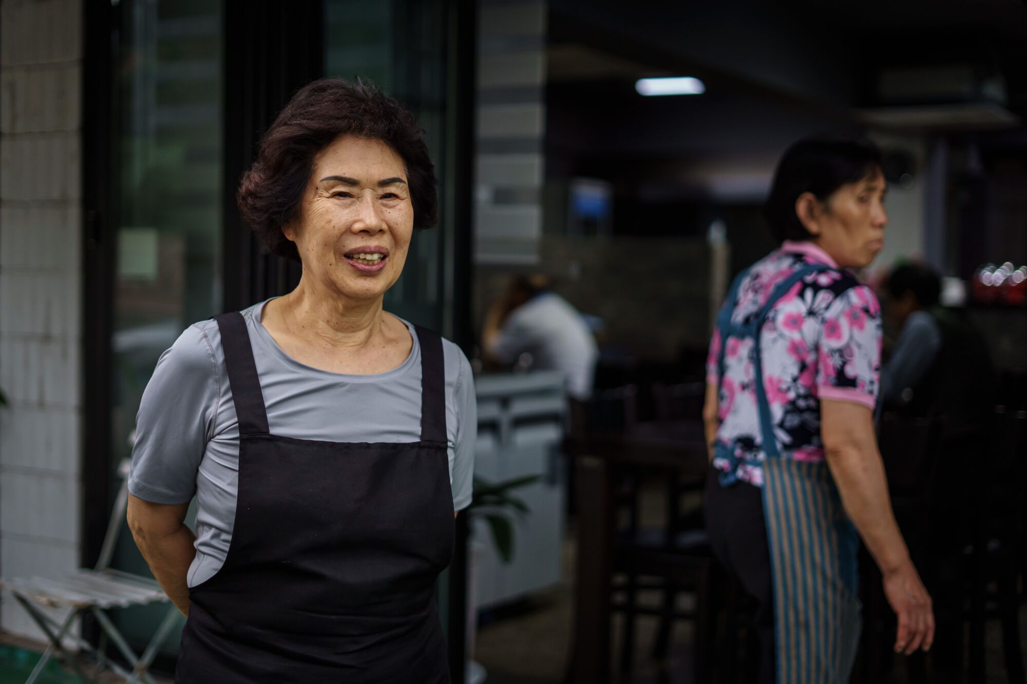 Suh Keum-ja, left, owns Suncheon Gisa Sikdang, a driver restaurant, in Seoul.
