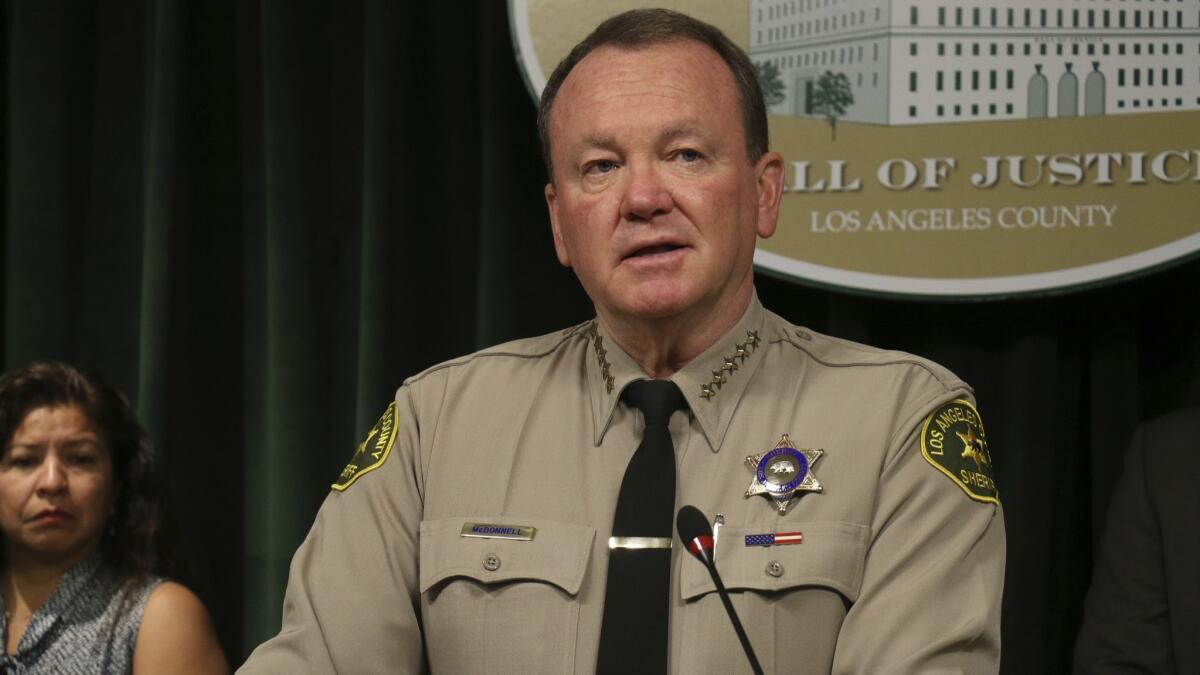 Los Angeles County Sheriff Jim McDonnell speaks at a news conference in downtown Los Angeles on July 17.