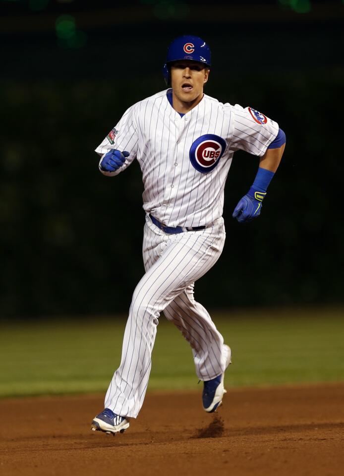 Chris Coghlan rounds the bases after his game-tying home run in the 8th inning.