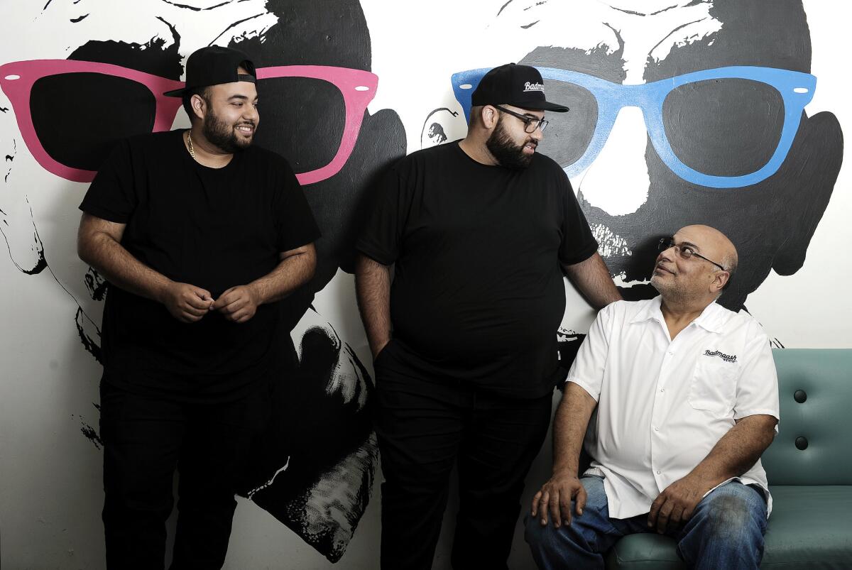 Chefs and owners of Badmaash are Pawan Mahendro, right, and sons Nakul and Arjun.