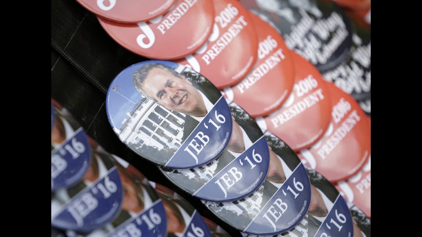 Political buttons are up for sale at Miami Dade College in Miami, where former Florida Gov. Jeb Bush officially announced his presidential run on Monday.