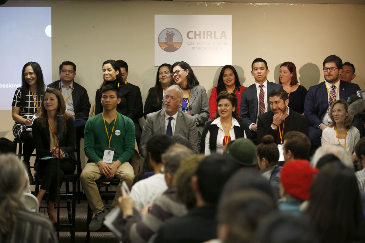 Some of the 24 candidates running to replace Xavier Becerra in Congress participate in a forum hosted by the Coalition for Humane Immigrant Rights of Los Angeles.